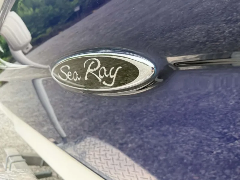 Slide: The Image of Close-up of Sea Ray 200 SD logo on a boat. - 22