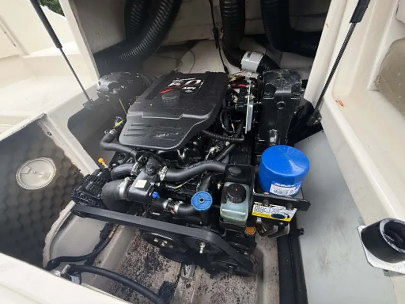Slide: The Image of Engine compartment of a 2006 Sea Ray 200 SD boat. - 27