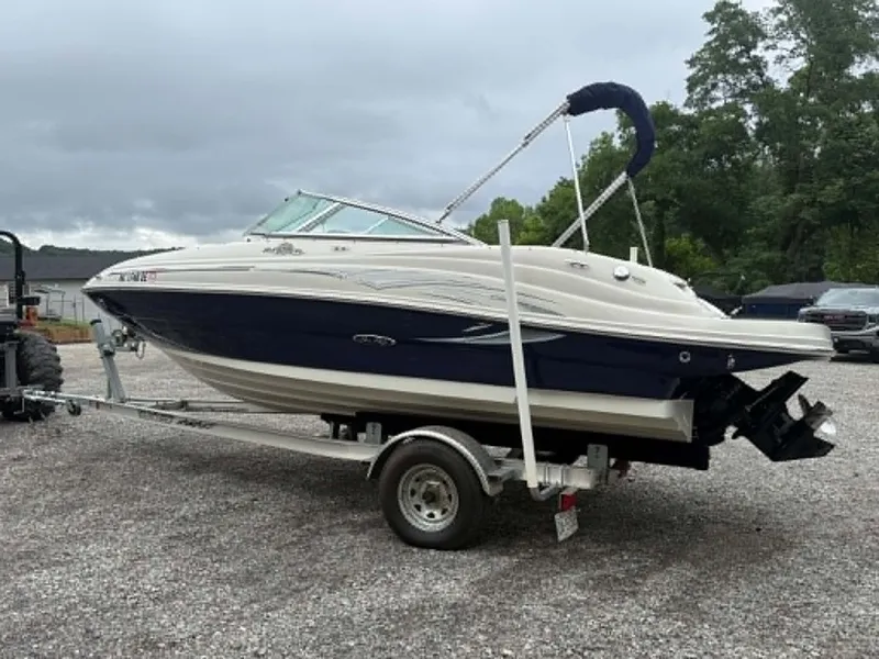 Slide: The Image of 2006 Sea Ray 200 SD boat on trailer, cloudy sky. - 3