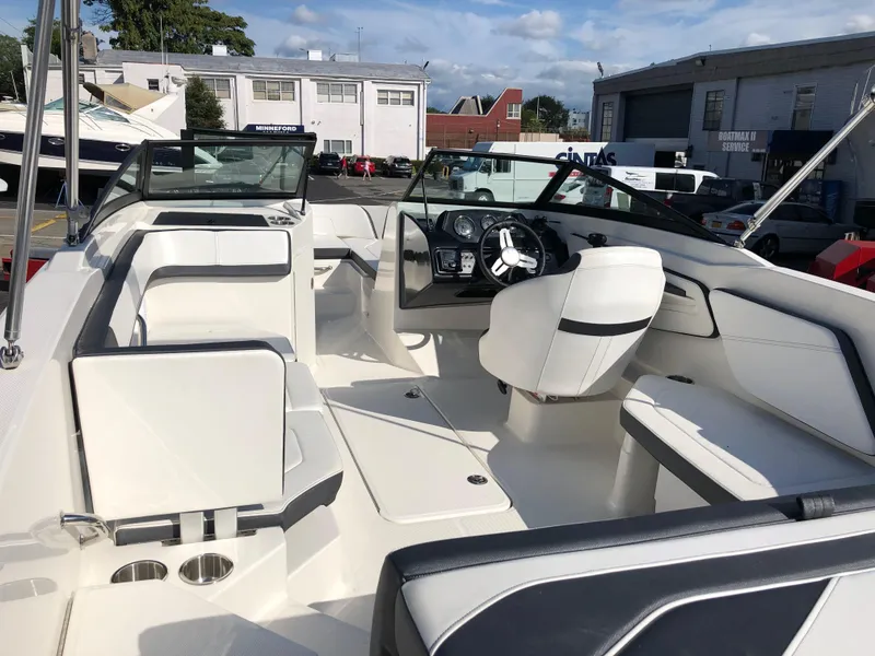 Slide: The Image of Interior view of a 2017 Sea Ray 21 SPX boat at the dock. - 12