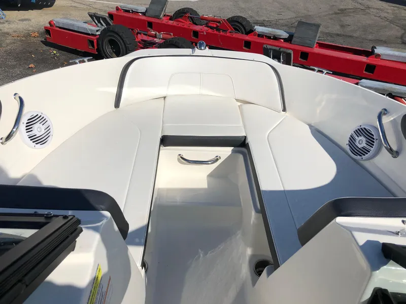 Slide: The Image of Interior view of a 2017 Sea Ray 21 SPX boat with white seating. - 15