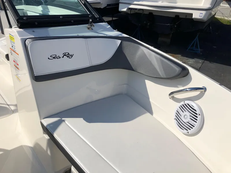 Slide: The Image of Interior of a 2017 Sea Ray 21 SPX boat with seating area. - 17