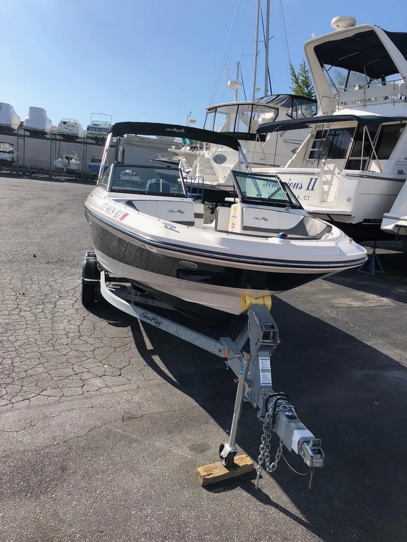Slide: The Image of 2017 Sea Ray 21 SPX boat on trailer at marina. - 3