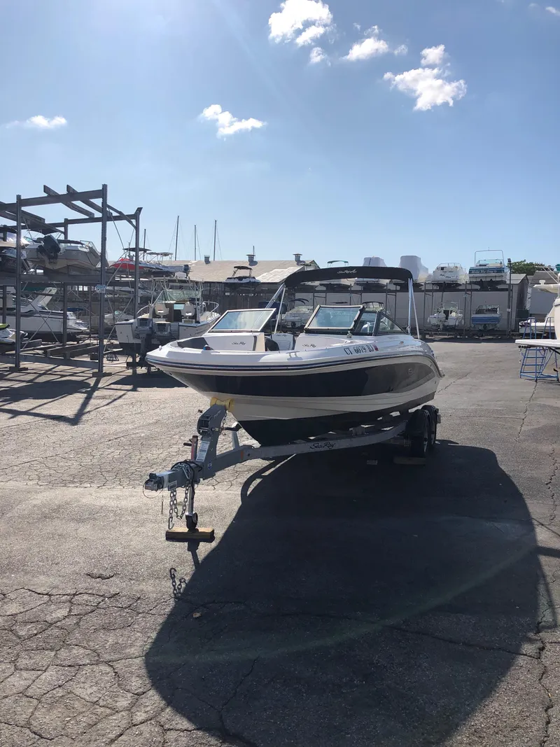 Slide: The Image of 2017 Sea Ray 21 SPX boat on trailer outdoors. - 4