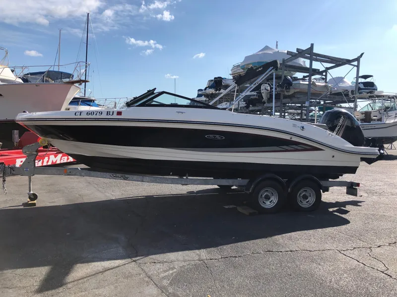 Slide: The Image of 2017 Sea Ray 21 SPX boat on trailer at marina. - 6
