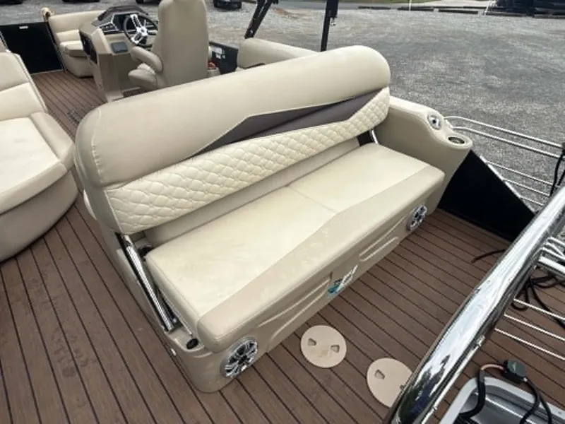Slide: The Image of 2019 Manitou SES 230 boat with luxurious interior seating. - 22