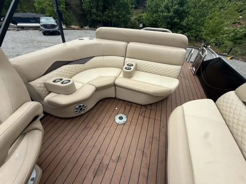 Slide: The Image of Interior of a 2019 Manitou SES 230 with beige leather seating. - 7