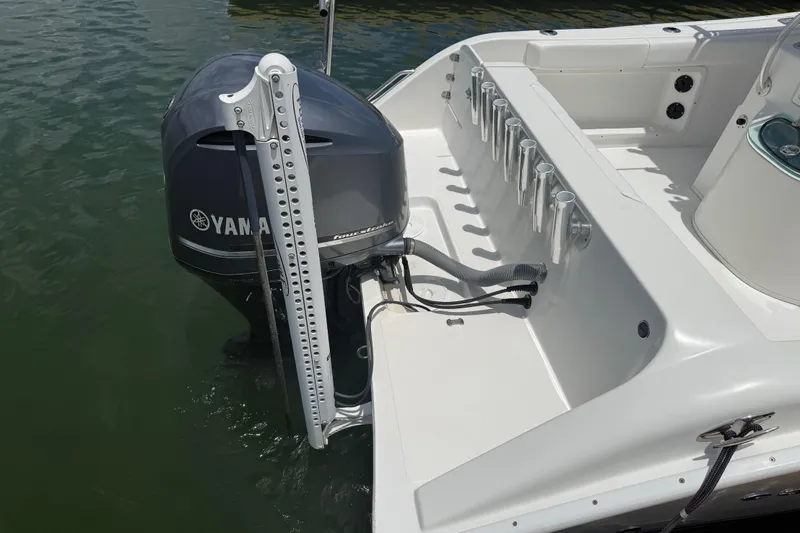 Slide: The Image of 2016 Cape Horn 22 OS boat with Yamaha outboard motor in water. - 13