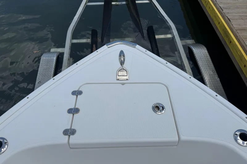 Slide: The Image of Bow of 2016 Cape Horn 22 OS boat on trailer at dock. - 36