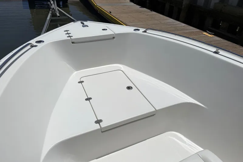 Slide: The Image of 2016 Cape Horn 22 OS boat interior with storage compartment, docked at marina. - 38