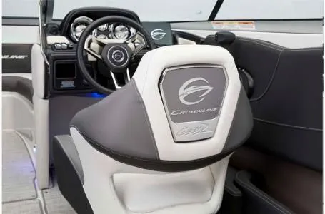 Slide: The Image of Interior of 2024 Crownline 200 SS boat with steering wheel and seat. - 11