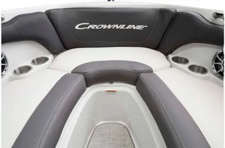 Slide: The Image of Interior of 2024 Crownline 200 SS boat with gray and white seating. - 14