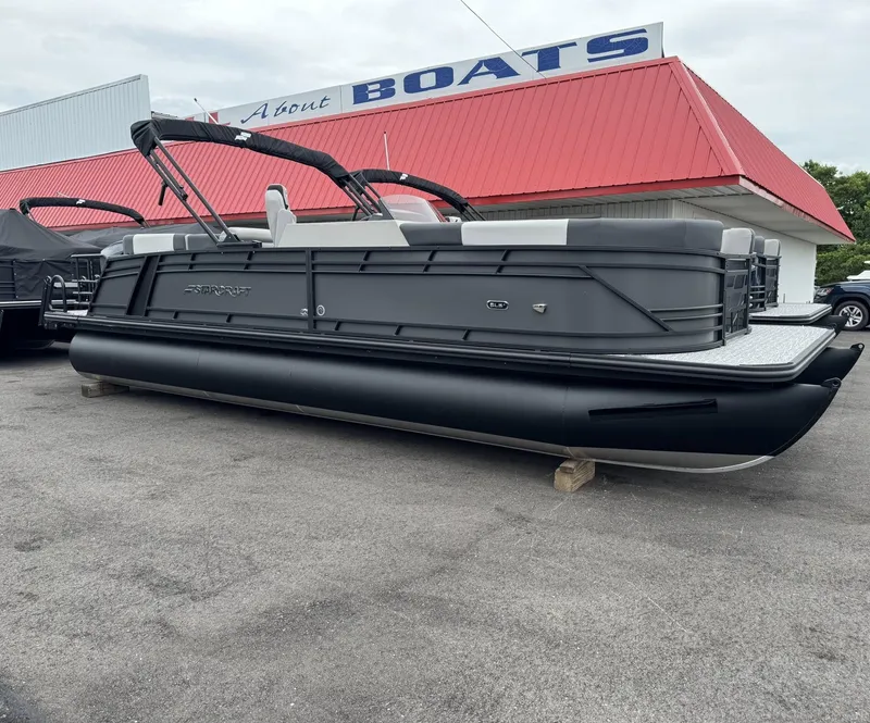 Slide: The Image of 2026 Starcraft SLS-5 R pontoon boat in front of a boat building. - 14