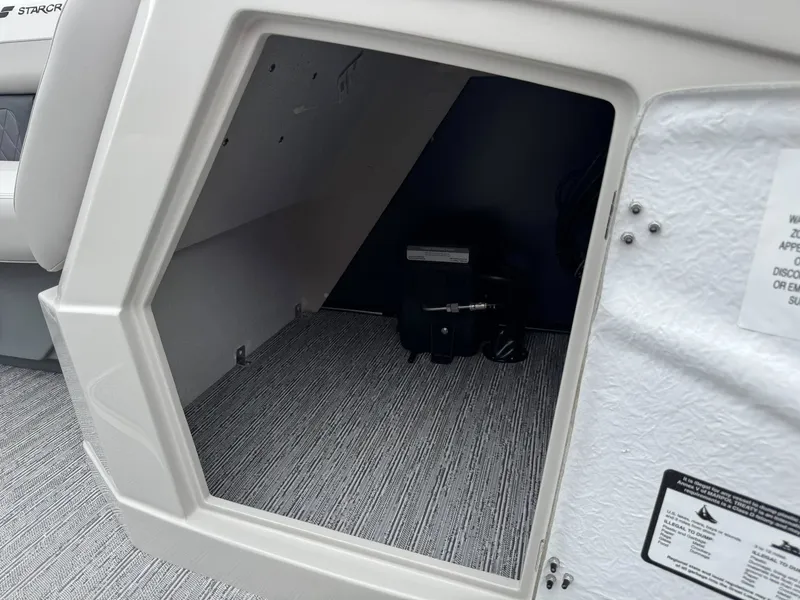 Slide: The Image of Interior of 2026 Starcraft SLS-5 R showing storage compartment. - 19