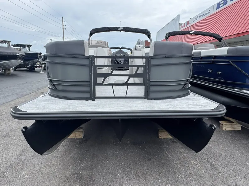 Slide: The Image of 2026 Starcraft SLS-5 R pontoon boat on a parking lot. - 23