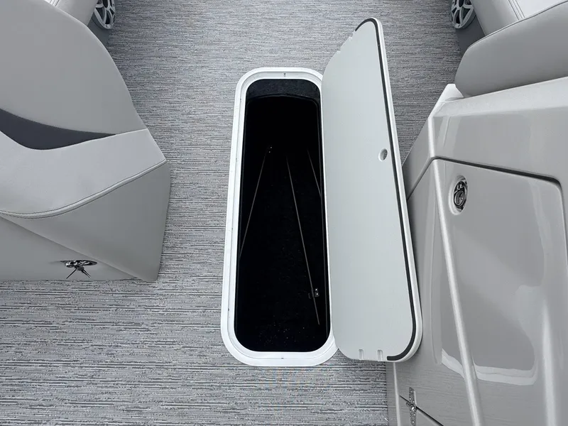 Slide: The Image of Starcraft SLS-5 R 2026 boat with open storage compartment lid. - 6