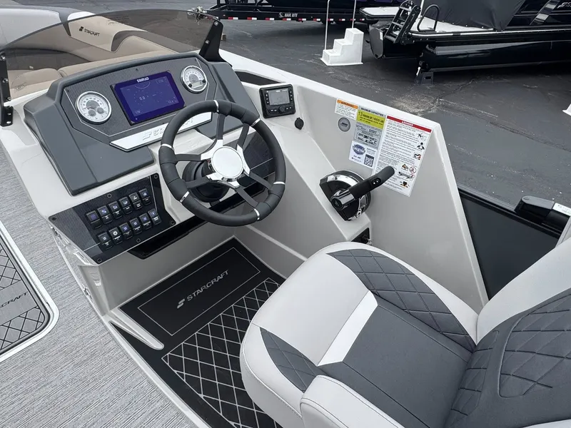 Slide: The Image of Interior of 2026 Starcraft SLS-5 R with modern helm station. - 9