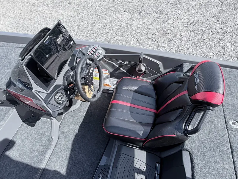 Slide: The Image of Interior of 2026 Skeeter ZXE21 with steering console and seat. - 13