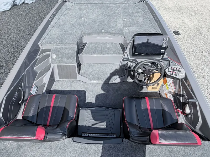 Slide: The Image of Interior of 2026 Skeeter ZXE21 boat with modern seats and steering console. - 16