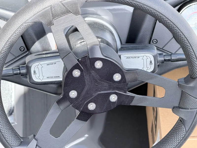 Slide: The Image of Steering wheel of a 2026 Skeeter ZXE21 boat. - 26