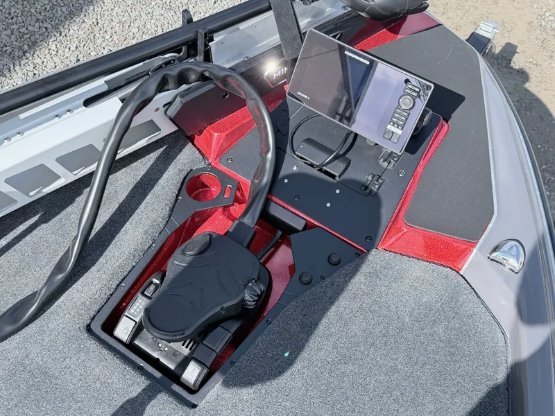 Slide: The Image of Skeeter ZXE21 2026 boat console with controls and display. - 29