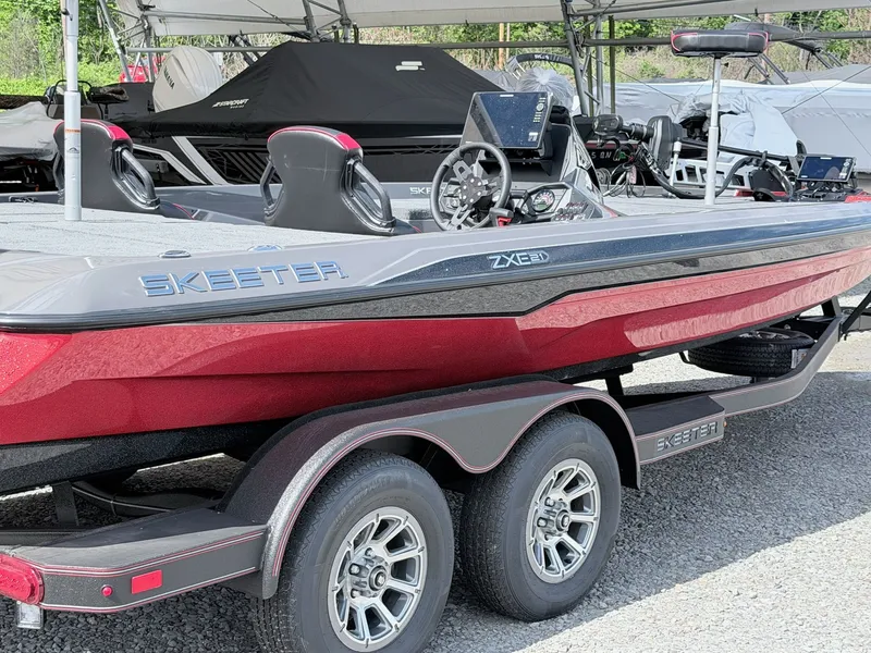 Slide: The Image of 2026 Skeeter ZXE21 boat on trailer, side view. - 31