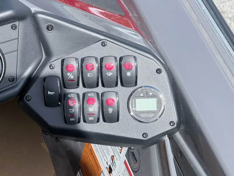 Slide: The Image of Control panel of Skeeter ZXE21 boat, year 2026. - 33