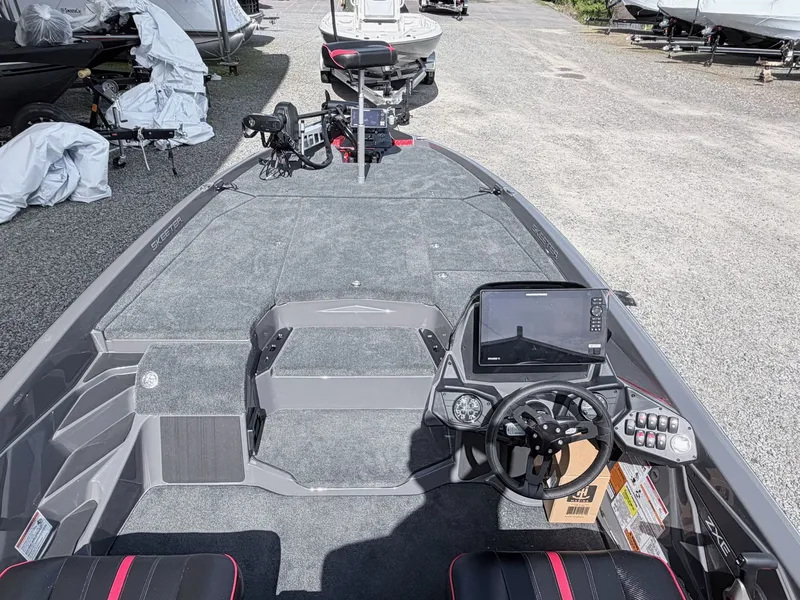 Slide: The Image of Interior view of 2026 Skeeter ZXE21 boat with modern control console. - 5