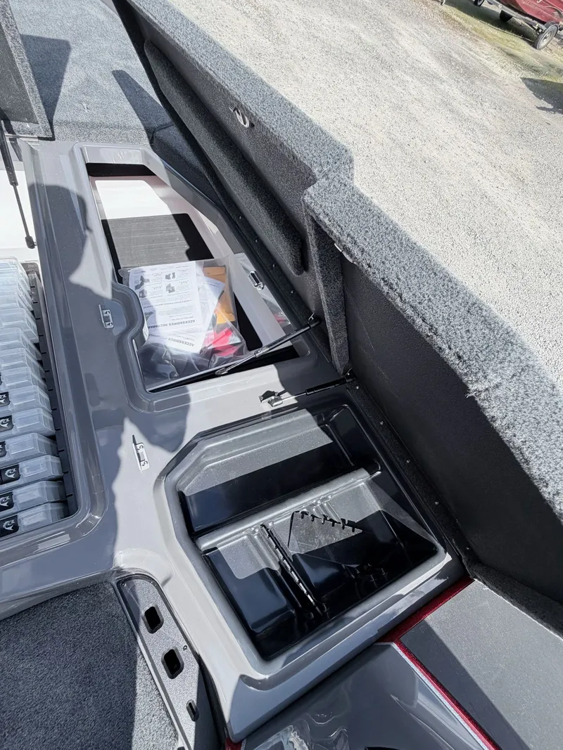 Slide: The Image of Interior view of Skeeter ZXE21 2026 with storage compartments. - 8
