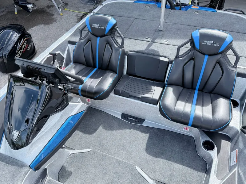 Slide: The Image of Interior of 2026 Skeeter ZXE20 with modern seats and steering console. - 14