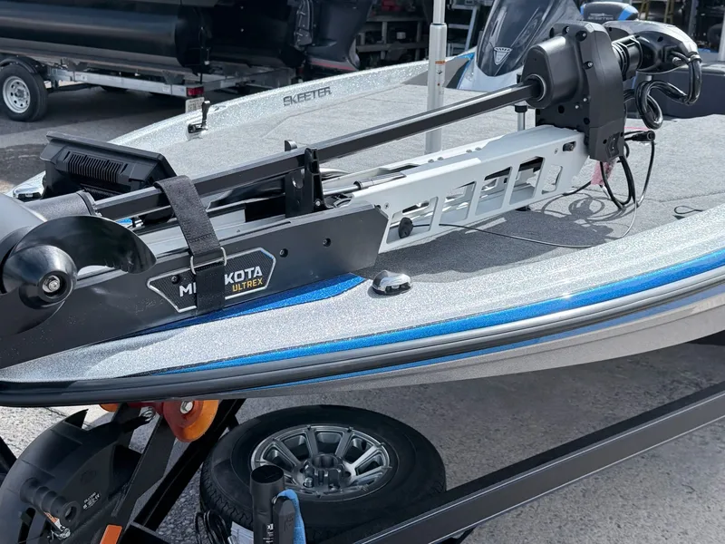 Slide: The Image of Skeeter ZXE20 2026 with Minn Kota Ultrex motor on trailer. - 21