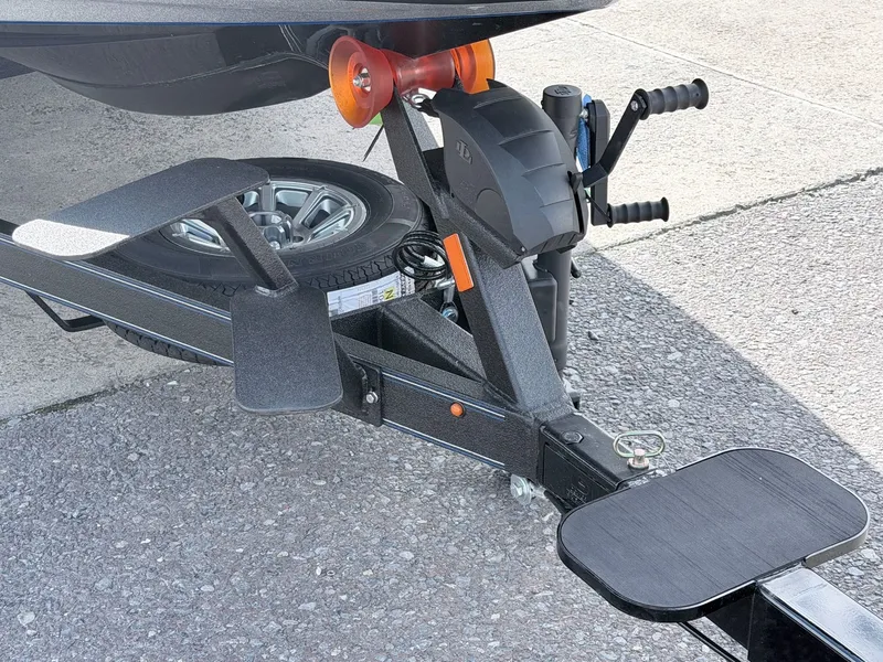 Slide: The Image of Skeeter ZXE20 2026 boat trailer with spare tire and winch. - 23