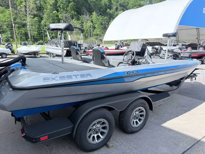 Slide: The Image of 2026 Skeeter ZXE20 boat on trailer outdoors. - 28