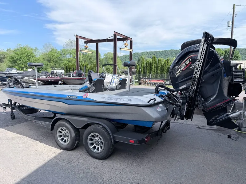 Slide: The Image of 2026 Skeeter ZXE20 boat on trailer parked outdoors. - 3
