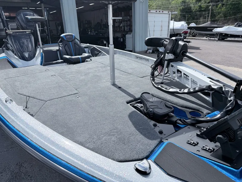 Slide: The Image of 2026 Skeeter ZXE20 boat with modern deck design and controls. - 40
