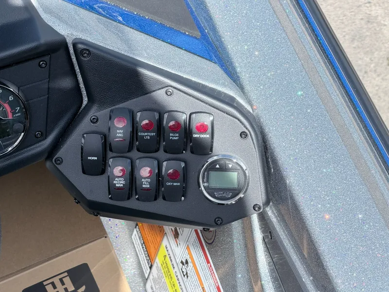 Slide: The Image of Control panel of a 2026 Skeeter ZXE20 boat. - 6