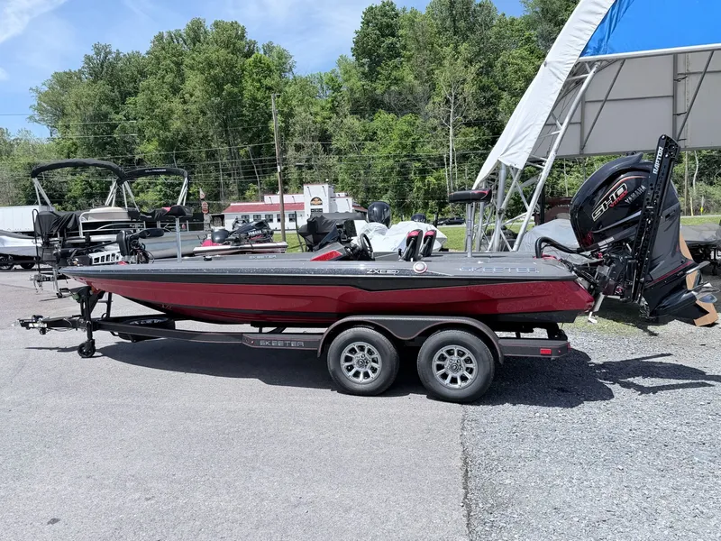 The Image of 2026 Skeeter ZXE20 boat parked on trailer outdoors. - 1