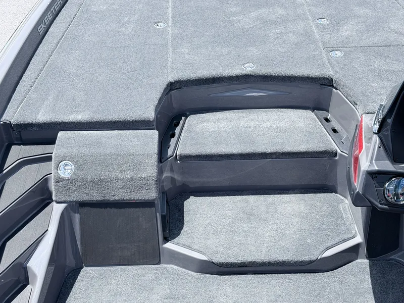 Slide: The Image of 2026 Skeeter ZXE20 boat deck with gray carpet. - 10