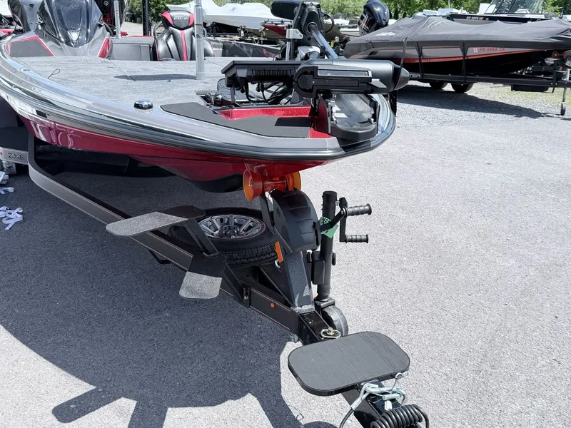 Slide: The Image of Skeeter ZXE20 2026 boat on trailer, front view. - 12