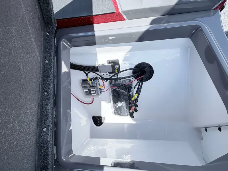 Slide: The Image of Interior of Skeeter ZXE20 2026 with cables and connectors. - 13