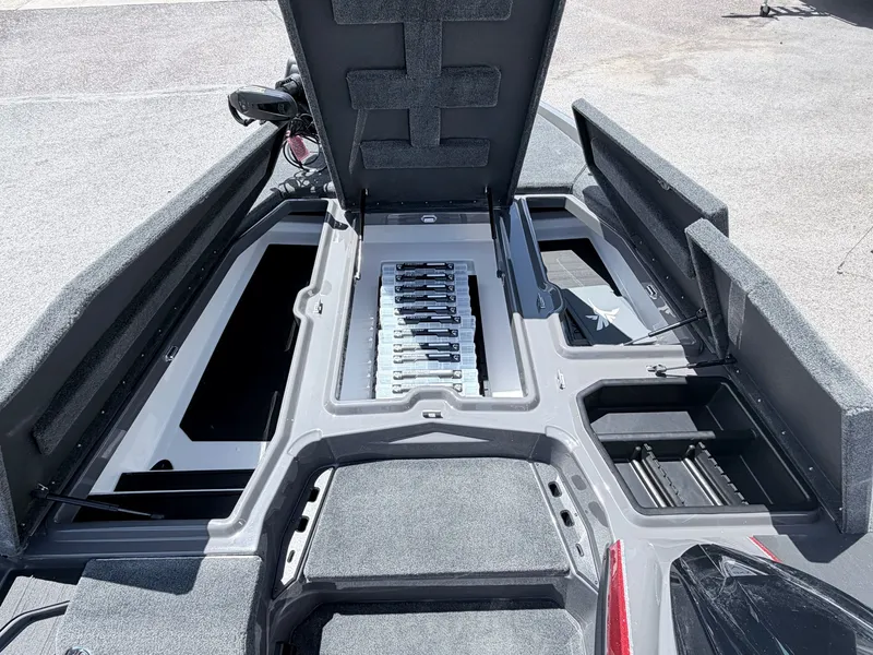 Slide: The Image of Interior view of 2026 Skeeter ZXE20 with open storage compartments. - 16
