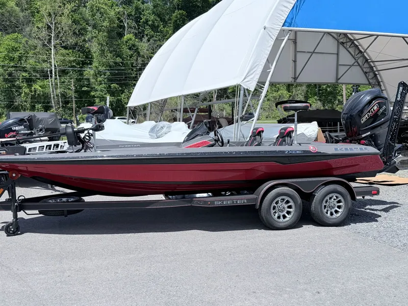 Slide: The Image of 2026 Skeeter ZXE20 boat on trailer outdoors. - 18