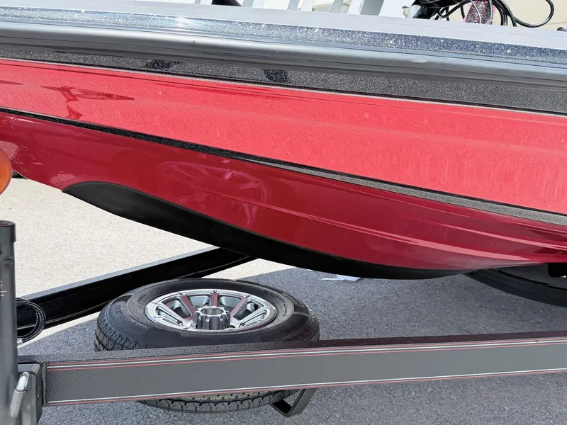 Slide: The Image of Red Skeeter ZXE20 boat hull on trailer, year 2026. - 19