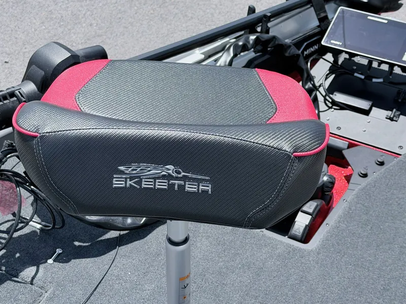 Slide: The Image of Skeeter ZXE20 boat seat, black and red, model 2026. - 31