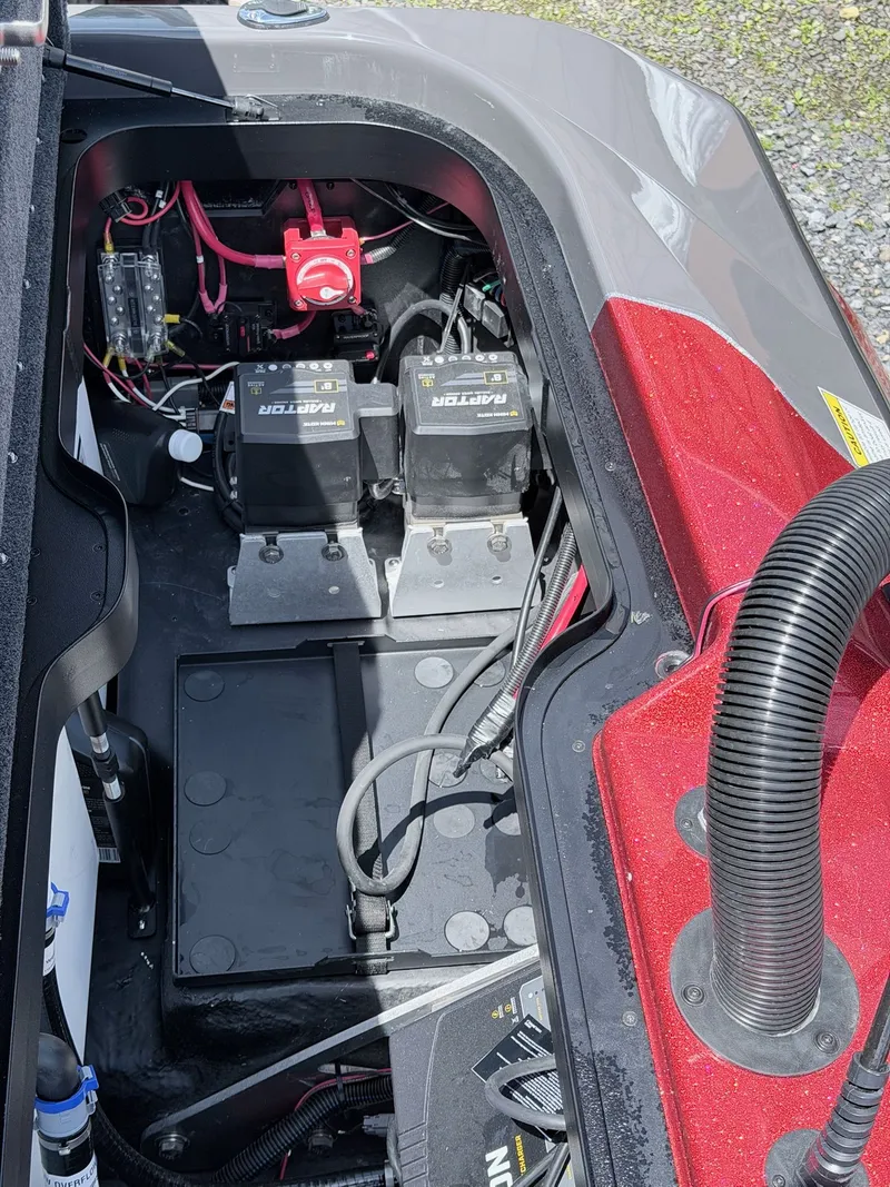 Slide: The Image of Interior view of 2026 Skeeter ZXE20 with batteries and wiring. - 33