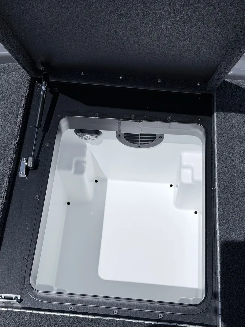 Slide: The Image of Open storage compartment in Skeeter ZXE20 boat, year 2026. - 39