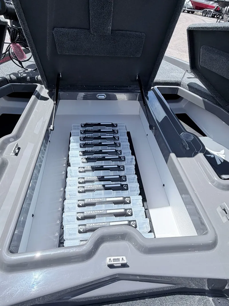 Slide: The Image of Skeeter ZXE20 2026 boat with open storage compartment and batteries. - 5