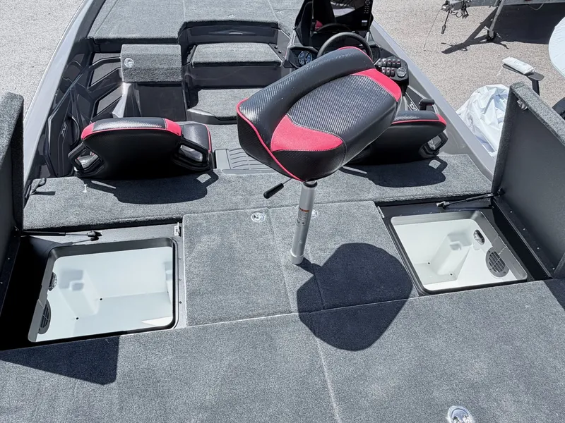 Slide: The Image of Interior of 2026 Skeeter ZXE20 boat with seating and storage compartments. - 6