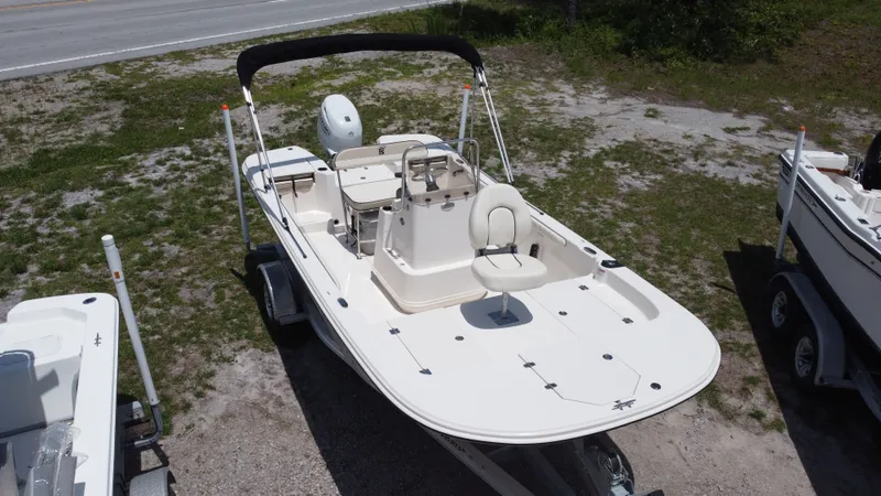 The Image of 2023 Carolina Skiff 17 LS boat parked on a trailer. - 1