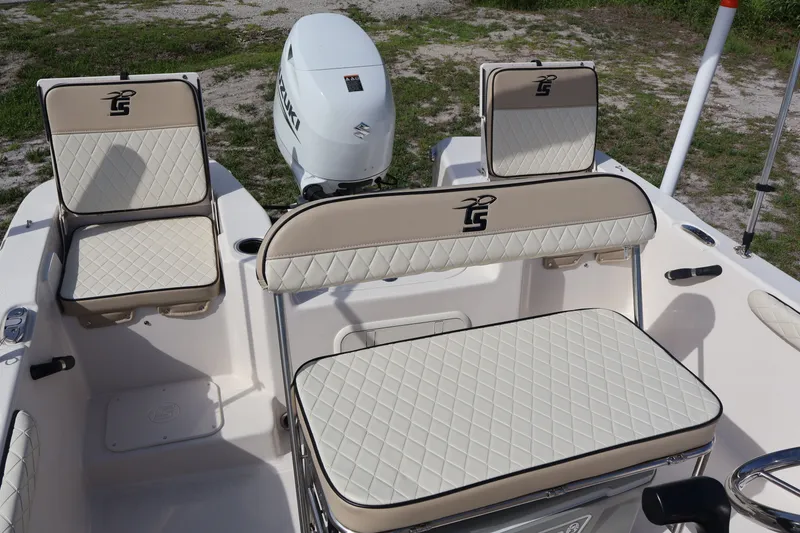 Slide: The Image of Interior of 2023 Carolina Skiff 17 LS with cushioned seating. - 11